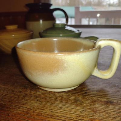 Collection of Pottery Kitchen Items- Pitcher, Coffee Cup, and Covered Bakers (K)