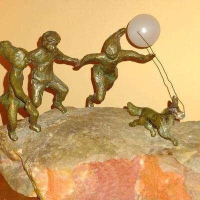 Family Chasing Dog with Balloon Brass Sculpture on Stone Base (K)