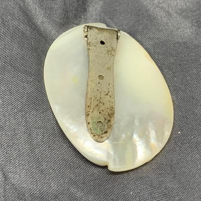 Lot 302: Collection of Vintage Cameos - 3” Pendant on a 24” Chain, 7. 1/2” Bracelet and a 2” Mother of Pearl Clip