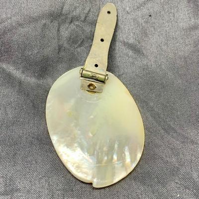 Lot 302: Collection of Vintage Cameos - 3” Pendant on a 24” Chain, 7. 1/2” Bracelet and a 2” Mother of Pearl Clip