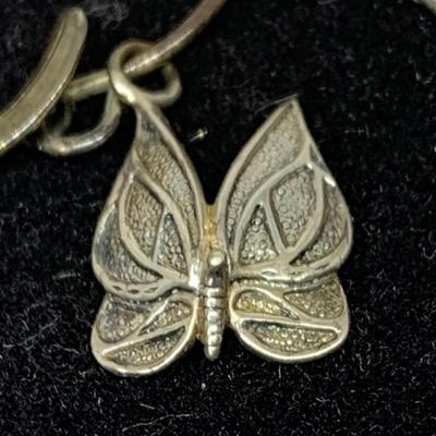 Lot 303: Franklin Mint - The Seven Days of Wishes Sterling Silver Charms and Wishbone Charm Holder and Chain and COA