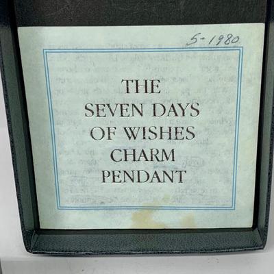 Lot 303: Franklin Mint - The Seven Days of Wishes Sterling Silver Charms and Wishbone Charm Holder and Chain and COA