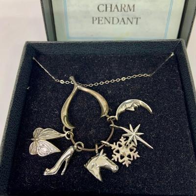 Lot 303: Franklin Mint - The Seven Days of Wishes Sterling Silver Charms and Wishbone Charm Holder and Chain and COA