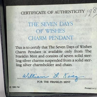 Lot 303: Franklin Mint - The Seven Days of Wishes Sterling Silver Charms and Wishbone Charm Holder and Chain and COA