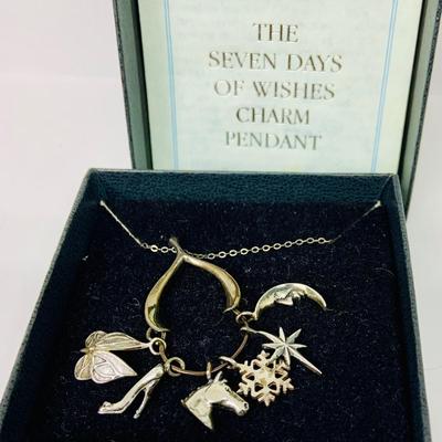 Lot 303: Franklin Mint - The Seven Days of Wishes Sterling Silver Charms and Wishbone Charm Holder and Chain and COA