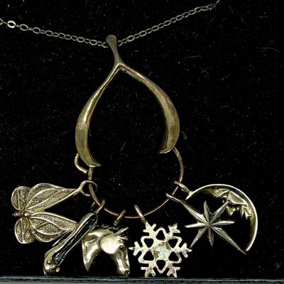 Lot 303: Franklin Mint - The Seven Days of Wishes Sterling Silver Charms and Wishbone Charm Holder and Chain and COA