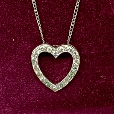 Lot 304: Sterling Silver and Rhinestone Heart Shape Pendant with 16” Chain and Elco 7” Sterling Silver Heart Chain Link Bracelet