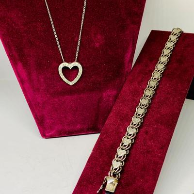 Lot 304: Sterling Silver and Rhinestone Heart Shape Pendant with 16” Chain and Elco 7” Sterling Silver Heart Chain Link Bracelet