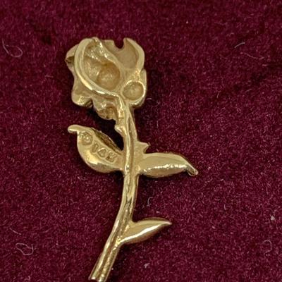Lot 308: Set of Two 14 Gold Charms”#1 Grandmom” and a Rose 1.20g Tw