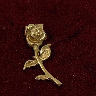 Lot 308: Set of Two 14 Gold Charms”#1 Grandmom” and a Rose 1.20g Tw