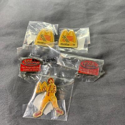 Lot 310: Large Assortment of McDonald’s Memorabilia Pins, Watches, and More