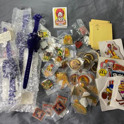 Lot 310: Large Assortment of McDonald’s Memorabilia Pins, Watches, and More