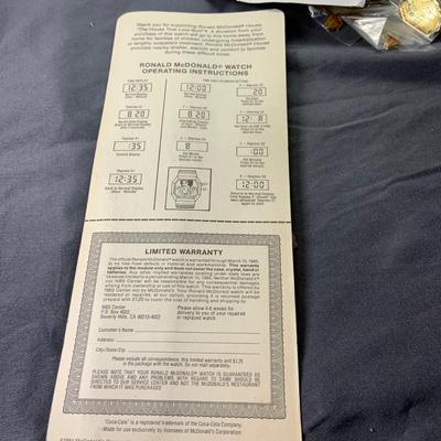 Lot 500: Large Assortment of Vintage McDonald’s Memorabilia Pins, Watches and More