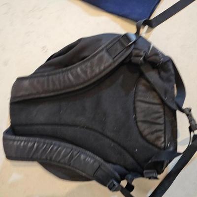 Sporting items for several sports - O'Neill Wet suit - Tennis balls - golfing - and a hiking backpack