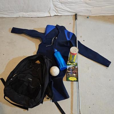 Sporting items for several sports - O'Neill Wet suit - Tennis balls - golfing - and a hiking backpack