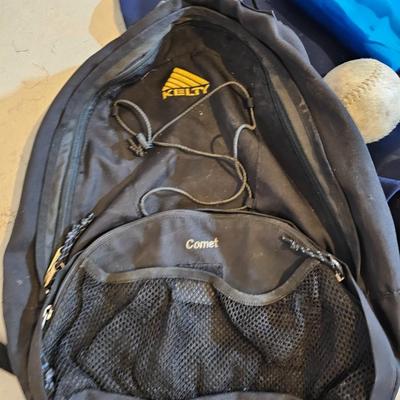 Sporting items for several sports - O'Neill Wet suit - Tennis balls - golfing - and a hiking backpack