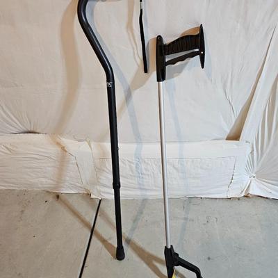 Adjustable aluminum cane and a Gripper stick tool