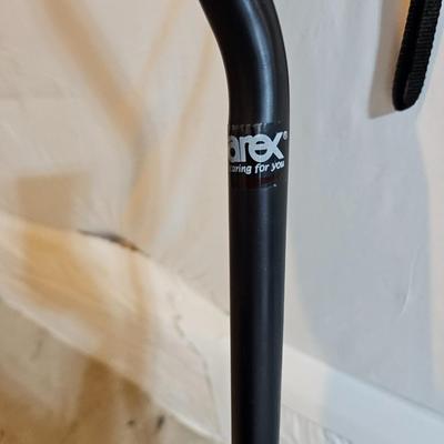 Adjustable aluminum cane and a Gripper stick tool