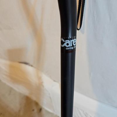Adjustable aluminum cane and a Gripper stick tool