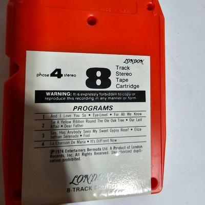 Seven 8 track cassettes in near mint condition - all soundtracks Rocky - Songbird and more