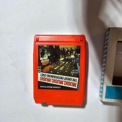 Seven 8 track cassettes in near mint condition - all soundtracks Rocky - Songbird and more