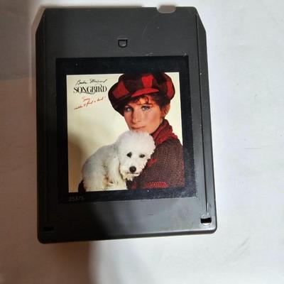Seven 8 track cassettes in near mint condition - all soundtracks Rocky - Songbird and more