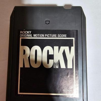 Seven 8 track cassettes in near mint condition - all soundtracks Rocky - Songbird and more