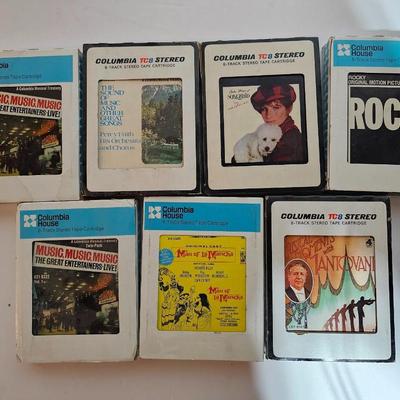 Seven 8 track cassettes in near mint condition - all soundtracks Rocky - Songbird and more
