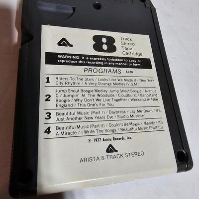 7 near mint 8 track cassettes - Barry Manilow - Barbara Butterfly - Olivia Newton John and more!