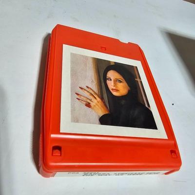 7 near mint 8 track cassettes - Barry Manilow - Barbara Butterfly - Olivia Newton John and more!