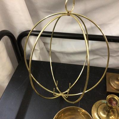 Sale Photo Thumbnail #264: You get copper tea pot, two sets of brass candle holder, metal ashtray, metal bowl with metal rings, and metal round holder.