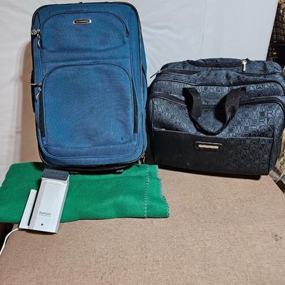 Two small carry-on / overnight sized luggage - Sonoma and Murano with a Remington travel clothes steamer