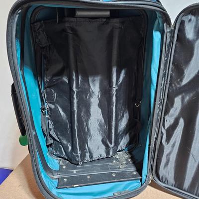 Two small carry-on / overnight sized luggage - Sonoma and Murano with a Remington travel clothes steamer