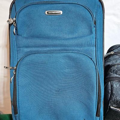 Two small carry-on / overnight sized luggage - Sonoma and Murano with a Remington travel clothes steamer