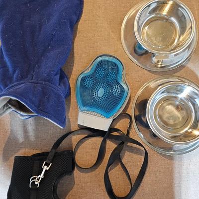 Small animal items - small coat - stainles water & food bowls - leash with harness and a grooming glove