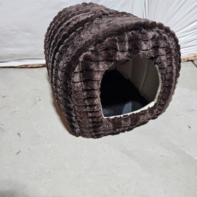 Cat play tunnel and a cat bed with ceramic food bowl