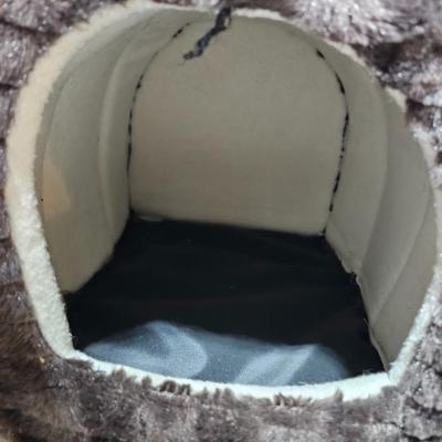 Cat play tunnel and a cat bed with ceramic food bowl