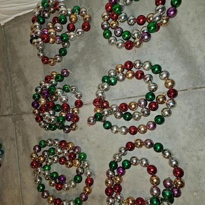 Six 7 foot long hard plastic Christmas garland - indoor outdoor use