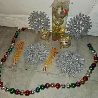 Large ornaments and snowflakes with a 7-foot garland Christmas Decor!