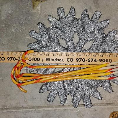 Large ornaments and snowflakes with a 7-foot garland Christmas Decor!