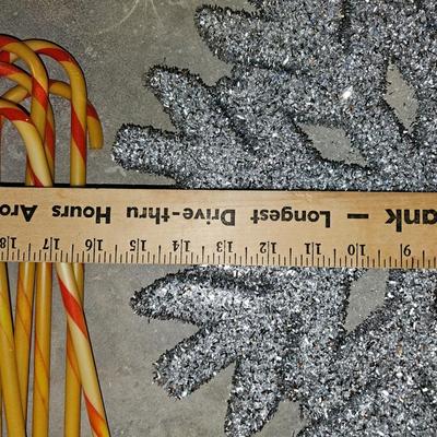 Large ornaments and snowflakes with a 7-foot garland Christmas Decor!