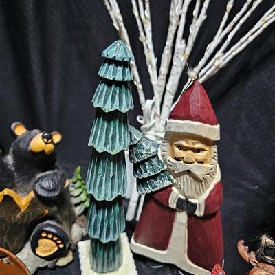 Rustic Christmas decorations, with throw rug, Big Santa, ceramic tree and more
