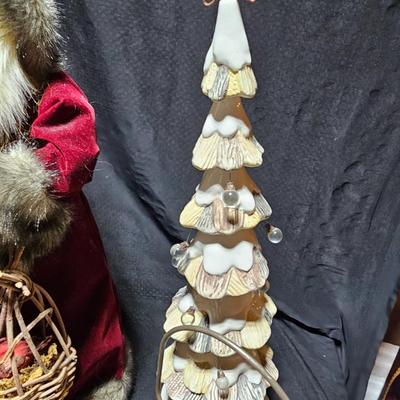 Rustic Christmas decorations, with throw rug, Big Santa, ceramic tree and more