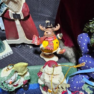 Rustic Christmas decorations, with throw rug, Big Santa, ceramic tree and more