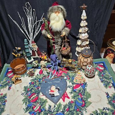 Rustic Christmas decorations, with throw rug, Big Santa, ceramic tree and more