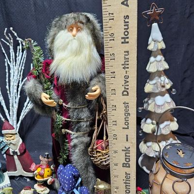 Rustic Christmas decorations, with throw rug, Big Santa, ceramic tree and more