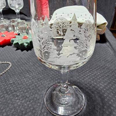 Christmas dinnerware, and decorations, Libbey wine glasses w/Etched Trees, Glass platter with Raised Scene and more
