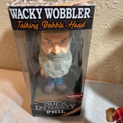 4 Bobble Heads: Tiger Woods, Football, Duck Dynasty