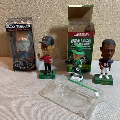 4 Bobble Heads: Tiger Woods, Football, Duck Dynasty