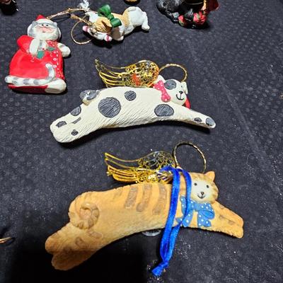 Christmas has gone to the dogs, and cats! All dog and cat ornaments perfect for pet lovers!